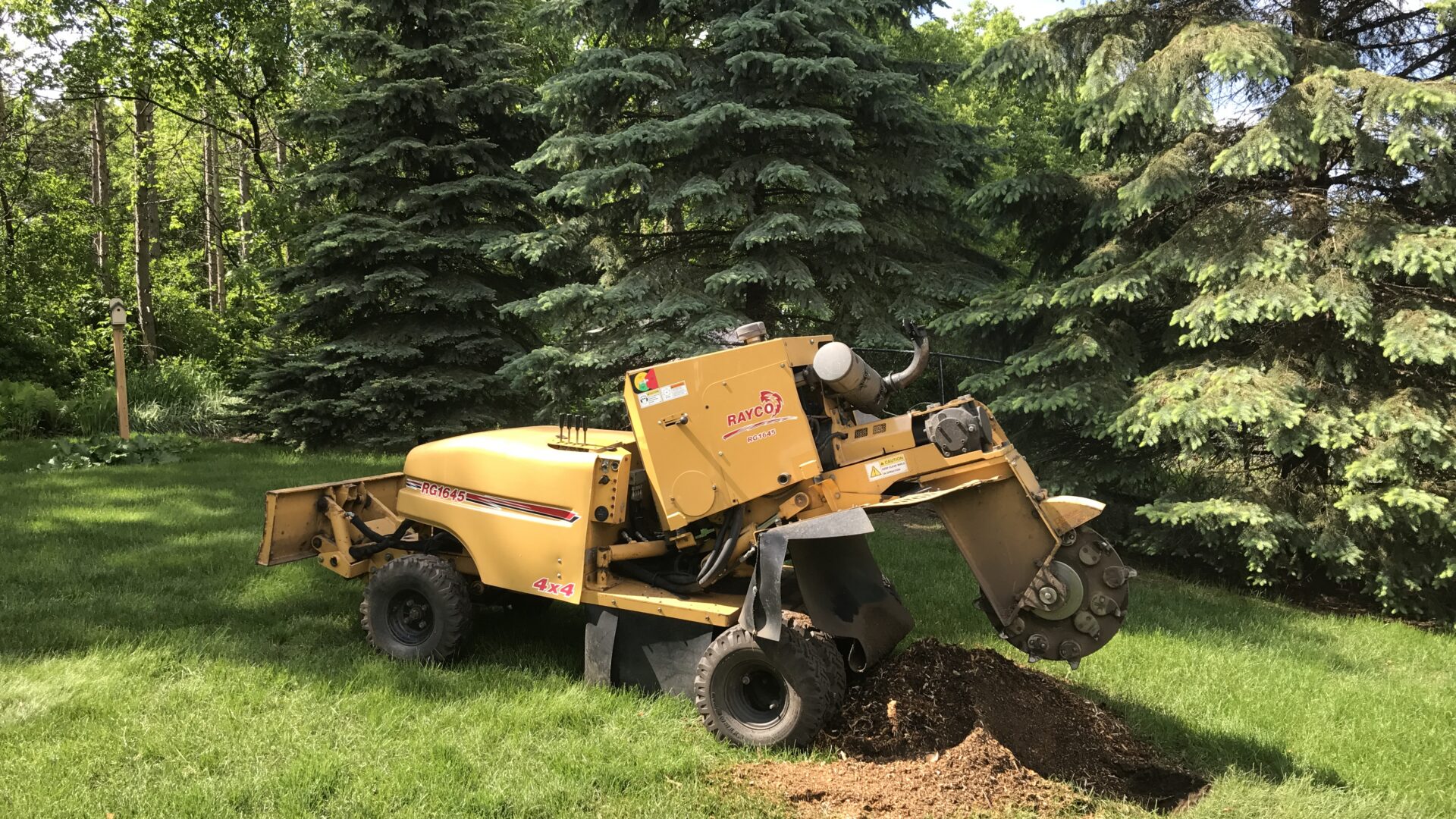 Rayco stump grinder after processing a stump